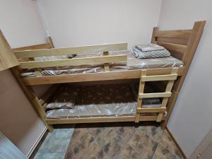 A bed or beds in a room at Hostel Ciro