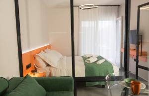 Posteľ alebo postele v izbe v ubytovaní IOANNINA SUITES