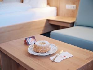Posteľ alebo postele v izbe v ubytovaní Genuss - und Vitalhotel Moisl