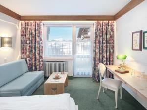 Posteľ alebo postele v izbe v ubytovaní Genuss - und Vitalhotel Moisl