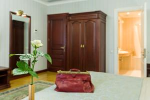 Postel nebo postele na pokoji v ubytování Villa Stanislavskyi Hotel