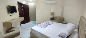 Katil atau katil-katil dalam bilik di شاليهات فندقيه بورتوسعيد