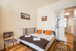 Posteľ alebo postele v izbe v ubytovaní BpR W21 Retro Home with balcony