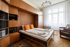 Posteľ alebo postele v izbe v ubytovaní BpR W21 Retro Home with balcony