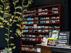 a book shelf filled with books in a bookstore at The Panorama Negombo in Negombo