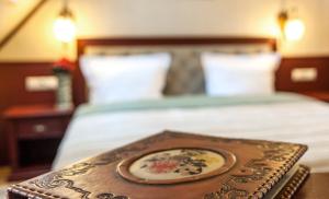 Postel nebo postele na pokoji v ubytování Villa Stanislavskyi Hotel