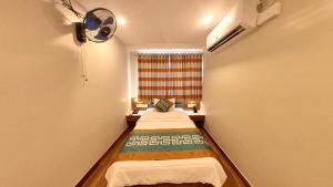 Posteľ alebo postele v izbe v ubytovaní Hotel GRT Square