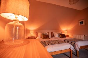 Voodi või voodid majutusasutuse Pabbay House toas