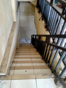 an overhead view of a staircase in a building at Ifrazim palem in Karang Tengah