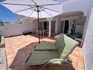 Posedenie v ubytovaní Casa Harmonia mit großer Sonnenterrasse und Meerblick in Top Lage