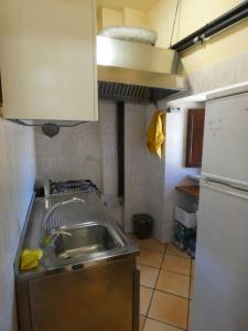 Kuchyň nebo kuchyňský kout v ubytování Dimora Fresilia Casa Vacanze
