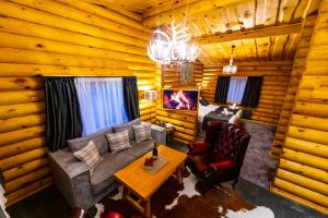 an overhead view of a living room in a log cabin at Kare Luxury Chalets in Tsigov Chark