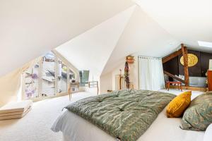 Кровать или кровати в номере GuestReady - Serene stay near Les Bois de Boulogne