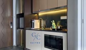 a kitchen with a sink and a counter top at Scarletz KLCC luxury suites by GC-Suites in Kuala Lumpur