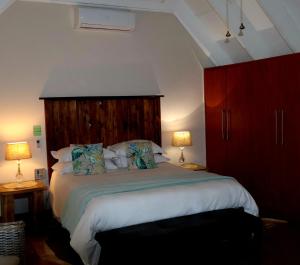 Ein Bett oder Betten in einem Zimmer der Unterkunft The Leopard Tree