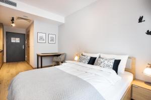 Aparthotel City Break Plac Wolności 6客房内的一张或多张床位