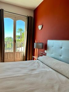 Postel nebo postele na pokoji v ubytování Apartamentos Balcón de Maro