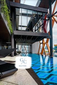 a view of a building with a swimming pool at Scarletz KLCC luxury suites by GC-Suites in Kuala Lumpur