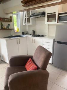 Kuchyň nebo kuchyňský kout v ubytování Le Colonial Cocoon Apartement 2