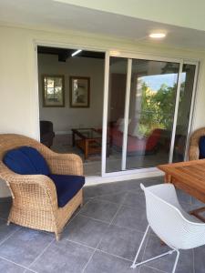 Posezení v ubytování Le Colonial Cocoon Apartement 2