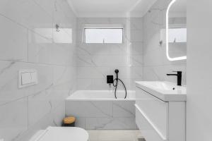 Koupelna v ubytování Stylish 3BR Apartment
