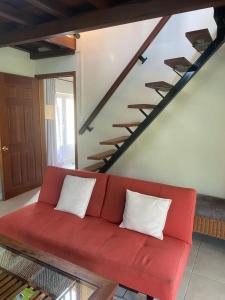Posezení v ubytování Le Colonial Cocoon Apartement 2