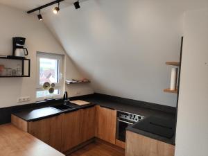 Photo de la galerie de l'établissement Ferienwohnung Völkel, à Röllbach 8 autres photos