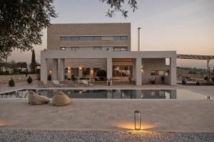 Πισίνα στο ή κοντά στο Diktamon Retreat Luxury Villa