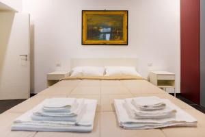 Posteľ alebo postele v izbe v ubytovaní Casa Sasù - Design modern apartment