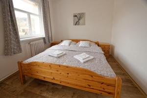 Postel nebo postele na pokoji v ubytování Penzion a restaurace na Křižovatce