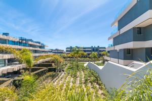 A garden outside Oasis 325 First Floor