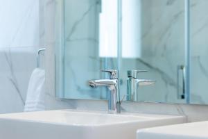 A bathroom at Oasis 325 First Floor