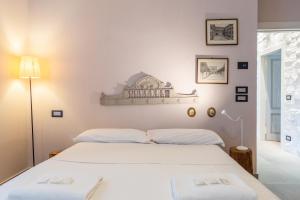 Ένα ή περισσότερα κρεβάτια σε δωμάτιο στο Un quadro sul Chianti