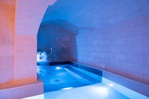 Bazén v ubytování Cenobio Hotel & SPA Matera nebo v jeho okolí