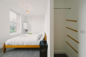 Giường trong phòng chung tại West Street 194- Hopewell