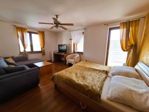 A bed or beds in a room at Penzión Villa Agnes