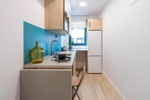 Kuchyň nebo kuchyňský kout v ubytování Micampus Salamanca Student Residence