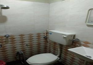 Koupelna v ubytování Hotel Rupali