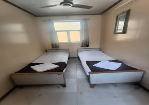 Voodi või voodid majutusasutuse Hotel Rupali toas +3 fotot