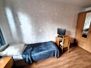 A bed or beds in a room at Penzión Villa Agnes