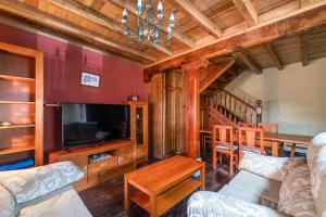 Televisyen dan/atau pusat hiburan di Casa Vacacional Vallina