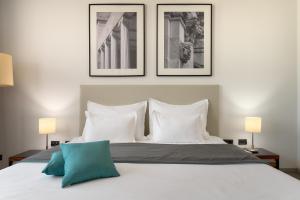 Ένα ή περισσότερα κρεβάτια σε δωμάτιο στο Hotel Atrium