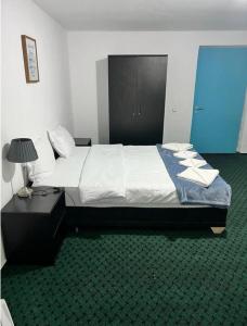 Postel nebo postele na pokoji v ubytování BAM Hotel