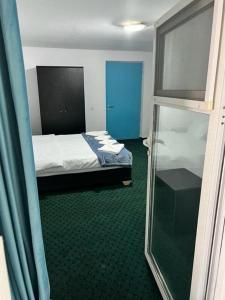 Postel nebo postele na pokoji v ubytování BAM Hotel