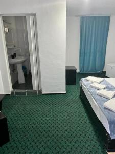 Postel nebo postele na pokoji v ubytování BAM Hotel
