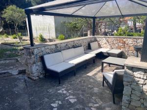 Posezení v ubytování Villa L'Ottagono con cucina parcheggio privato telecamerizzato e wifi