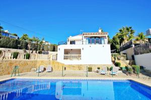 Poolen vid eller i närheten av Droomland - sea view villa with private pool in Moraira