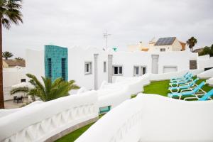 a view of the white buildings of the resort at Gaviotas Golf Beach in Almerimar