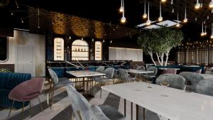 a dining room with white tables and chairs at RENEX HOTELS in Antalya