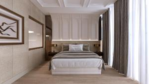 a bedroom with a large bed in a room at RENEX HOTELS in Antalya